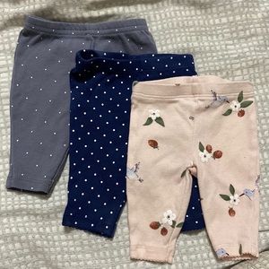 Carters. Newborn. Grey with polka dots, Blue with polka dots, pink with floral.